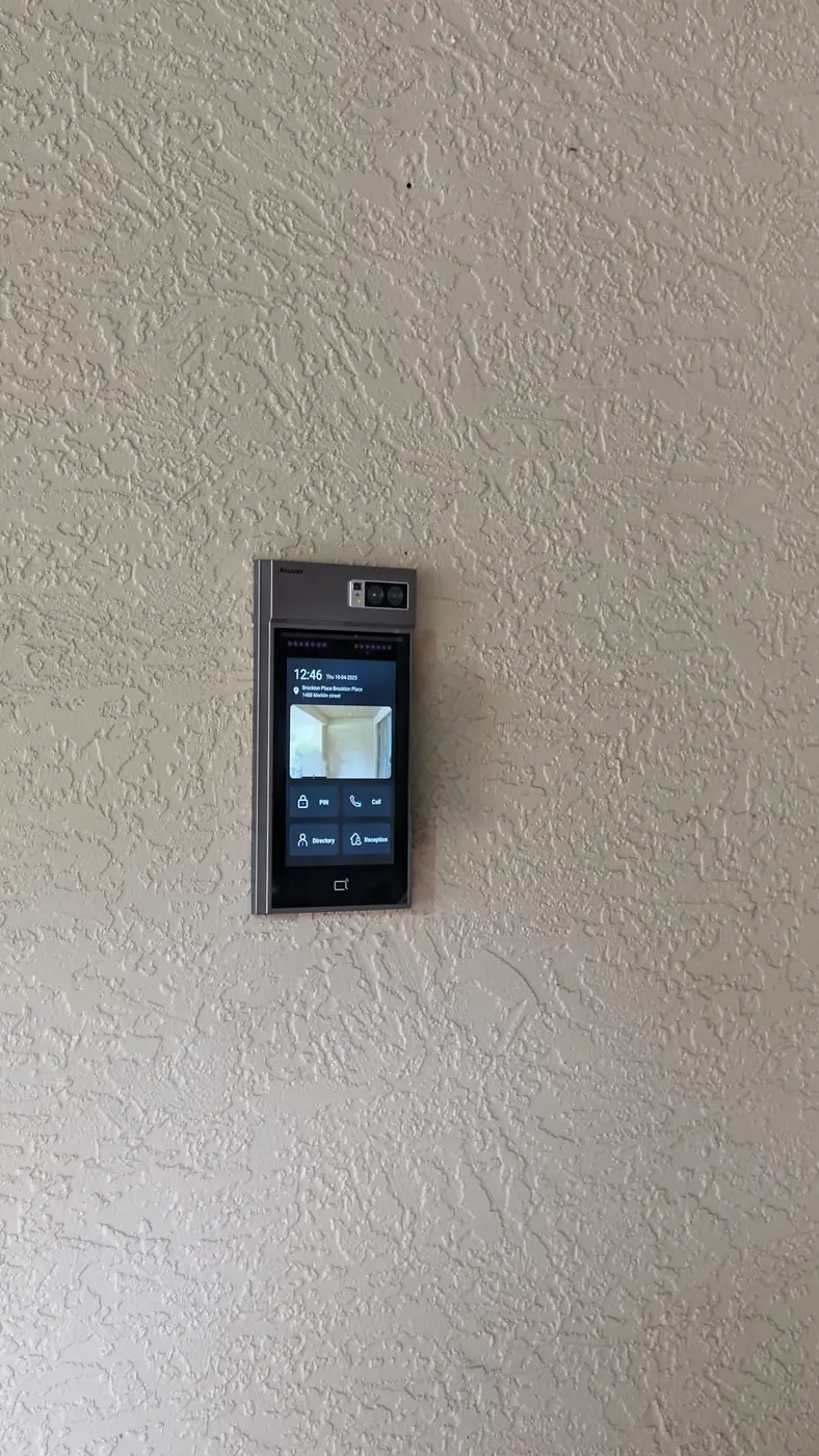 Compact vandal-resistant Akuvox video intercom at Brockton Place after WeTech concealed the visible wiring