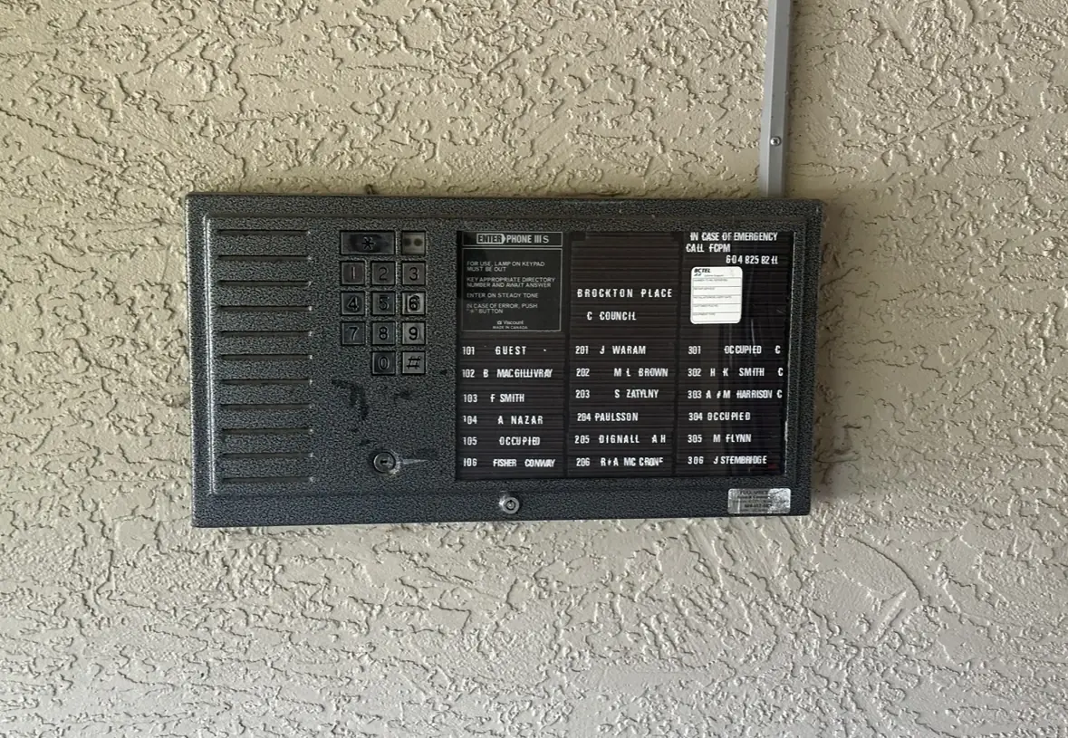 Old Enterphone at Brockton Place in White Rock with visible surface-mounted wiring before the upgrade