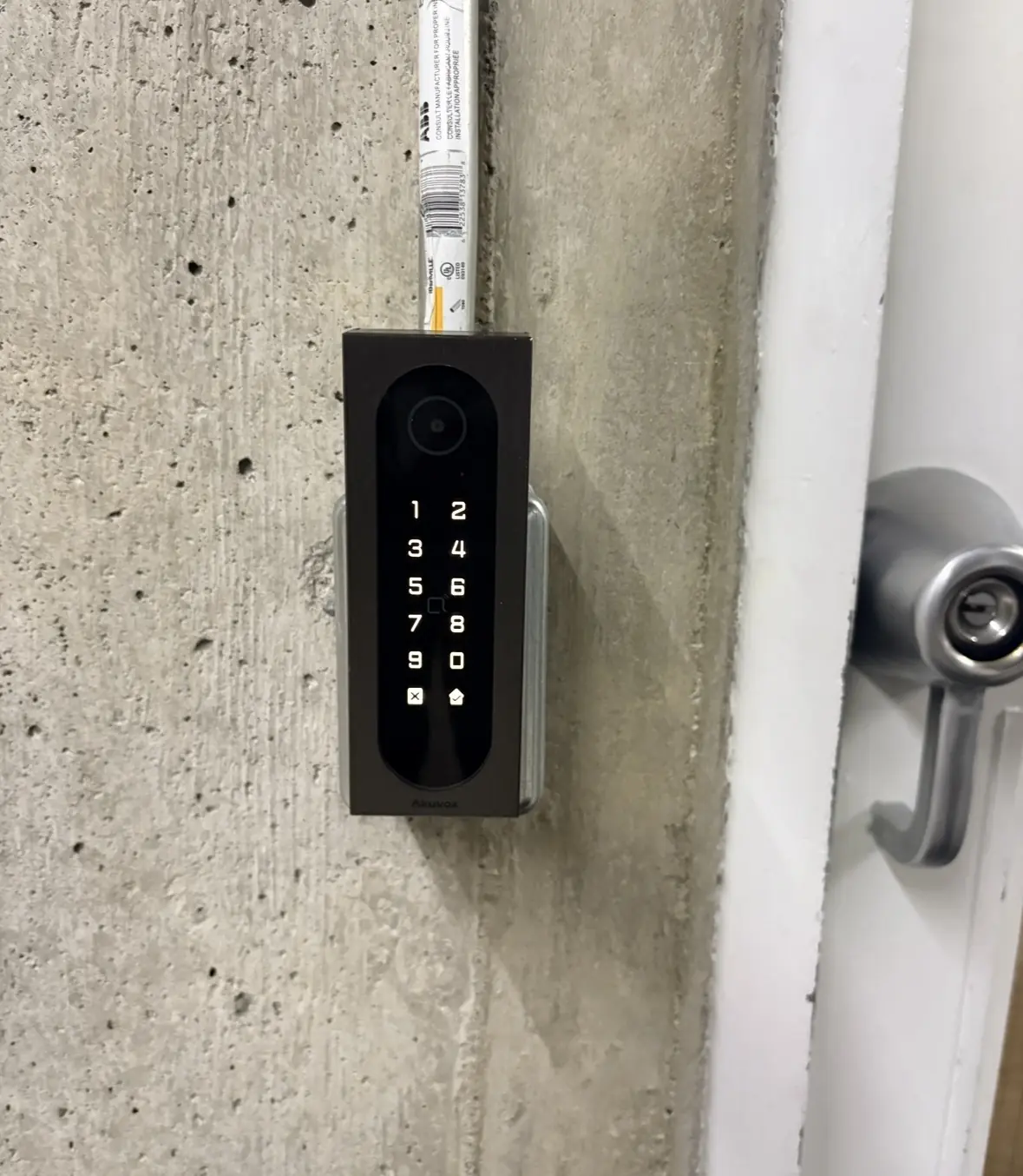 Akuvox access reader and keypad at Carlton Court supporting fob, BLE, NFC, PIN and app-based entry