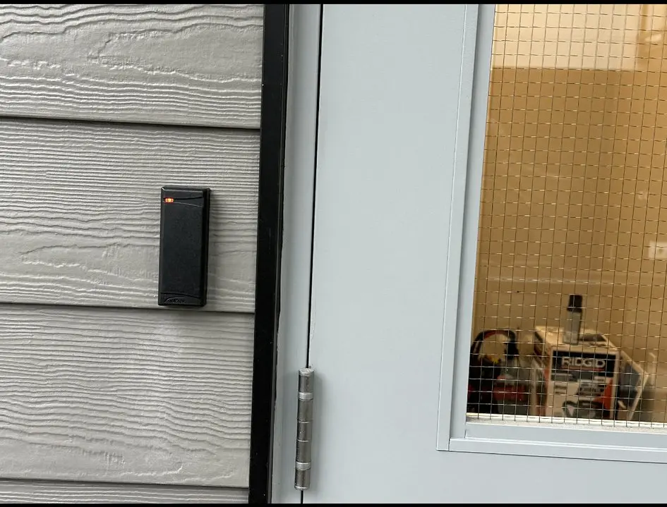 Kantech proximity fob reader installed beside an exterior access door at Horizon in Surrey
